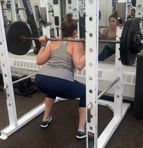 Katie squatting